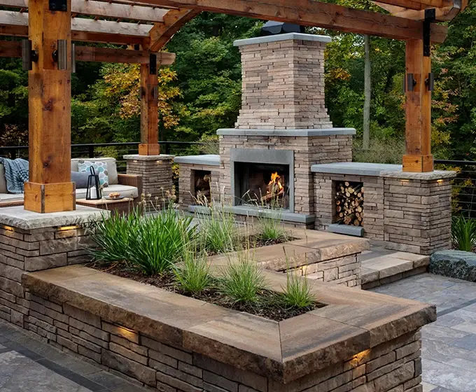 hardscape design large stone fire pit with wood pergola